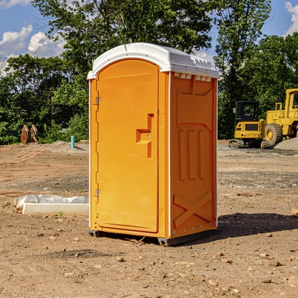 how often are the portable restrooms cleaned and serviced during a rental period in Paw Paw